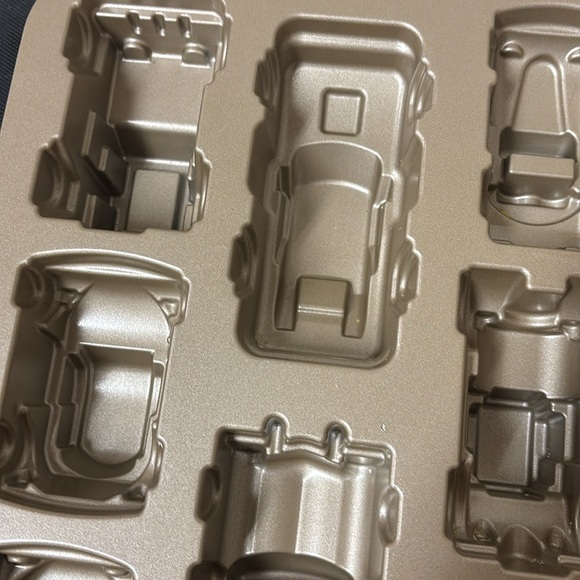 Practically new  Nordic Ware baking mold of eight mini car shapes. - Picture 5 of 7